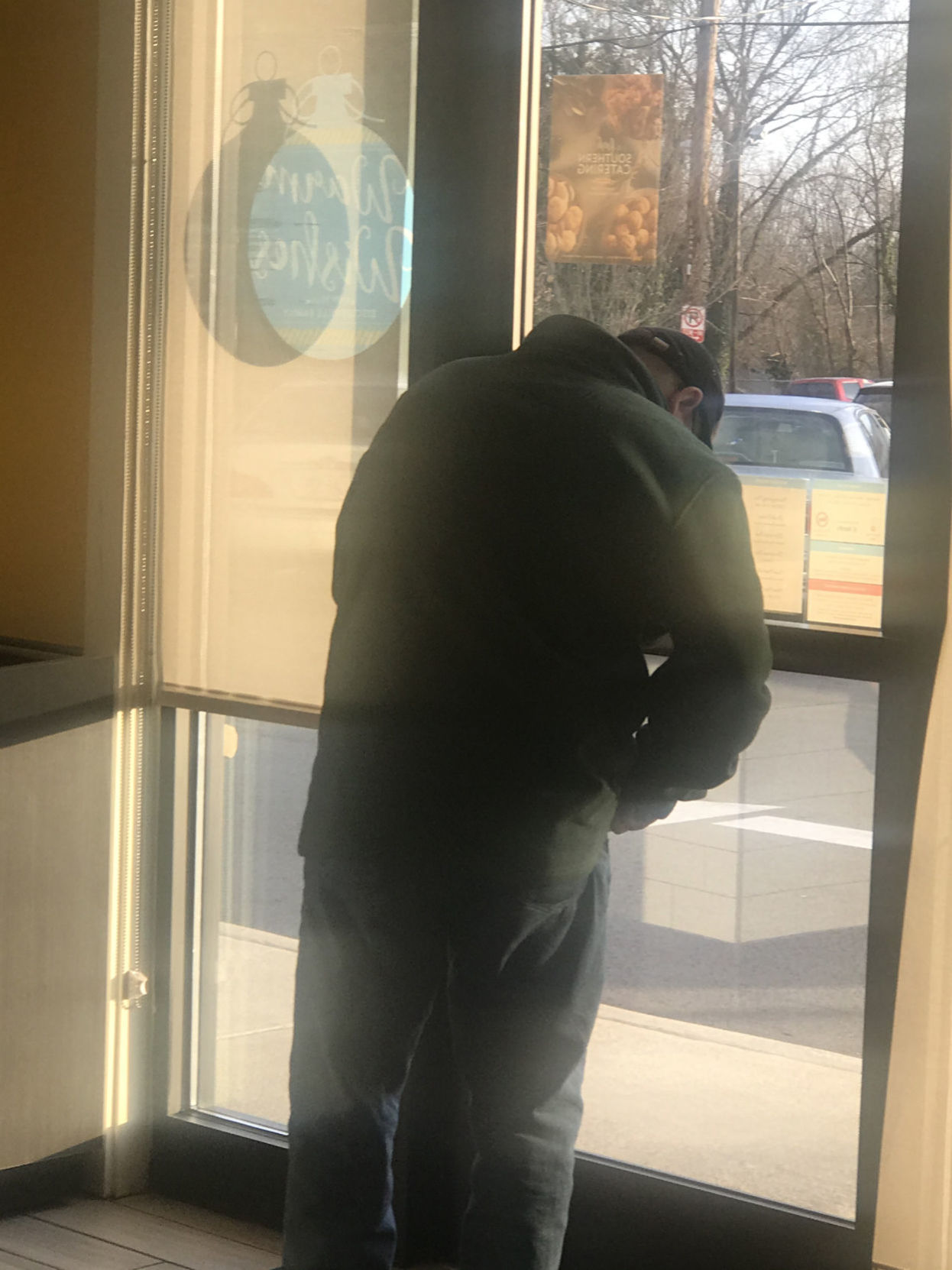 Picture of suspect leaving restaurant (copy)